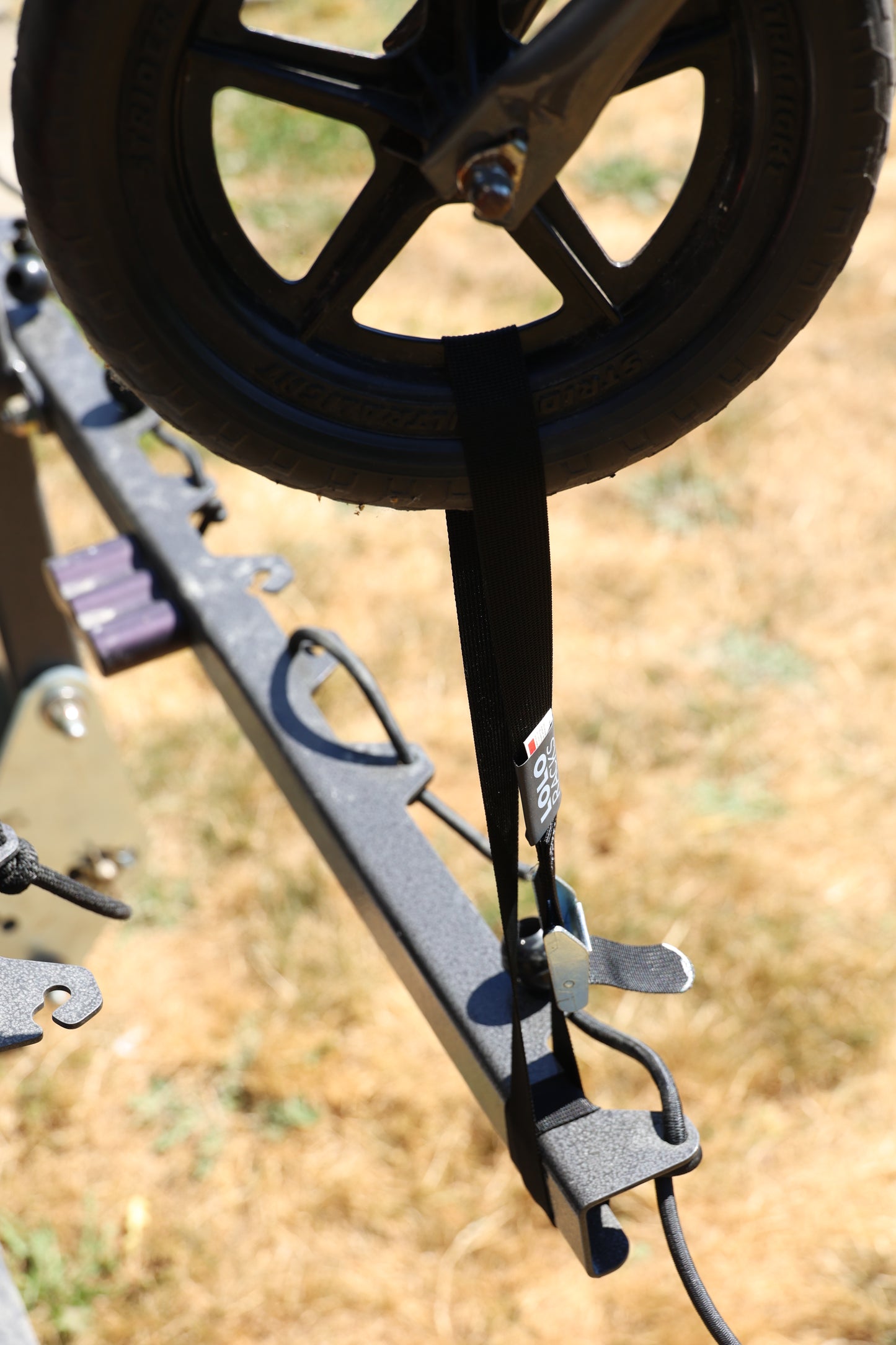 Cam Strap for child's bike or additional retention