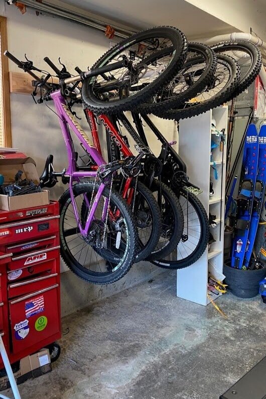 The lolo rack fits great in your garage and takes up much less space than a wheel bucket style rack.